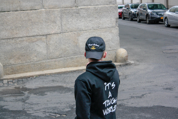 It's A Tough World hoodie on a New York street